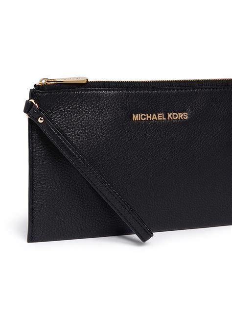 michael kors clutch schwarz sale|Michael Kors women's black clutch.